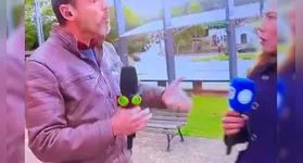 Nas imagens não é possível ver, mas a repórter da Record declarou que o jornalista do Band a empurrou