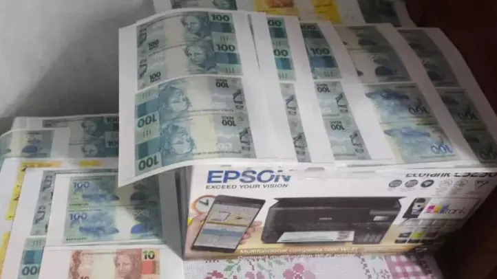Impressora e dinheiro falso apreendido pela PC