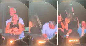 Kristin Cabot tentou se esconder das câmeras quando foi flagrada dançando nos braços do chefe durante show do Coldplay nos EUA.
