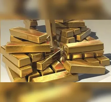 Imagem ilustrativa da imagem Ouro bate recorde com shutdown do governo nos EUA; veja como investir