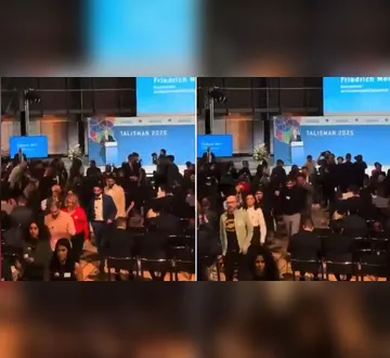 Imagem ilustrativa da imagem Plateia deixa evento antes de discurso de chanceler alemão