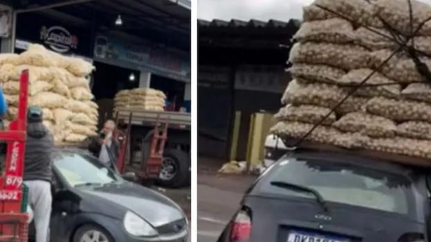 Carro é pequeno, mas condutor carregou de sacas de batatas