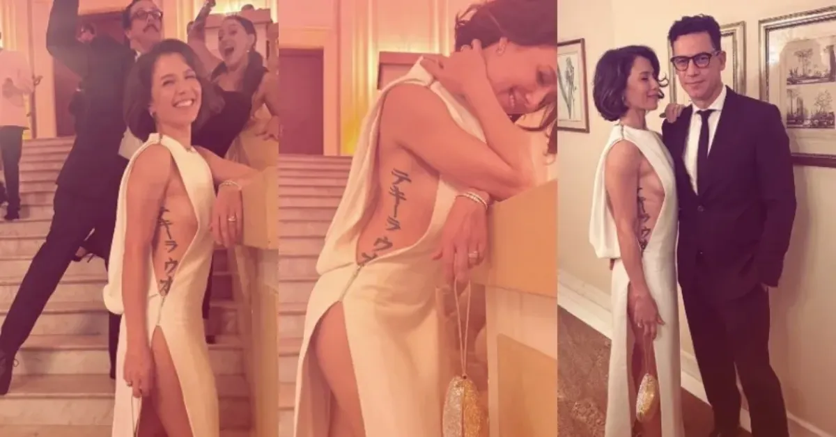 Marjorie Estiano surge com vestido de gala e tatuagem à mostra ao lado do namorado em evento no Rio de Janeiro.