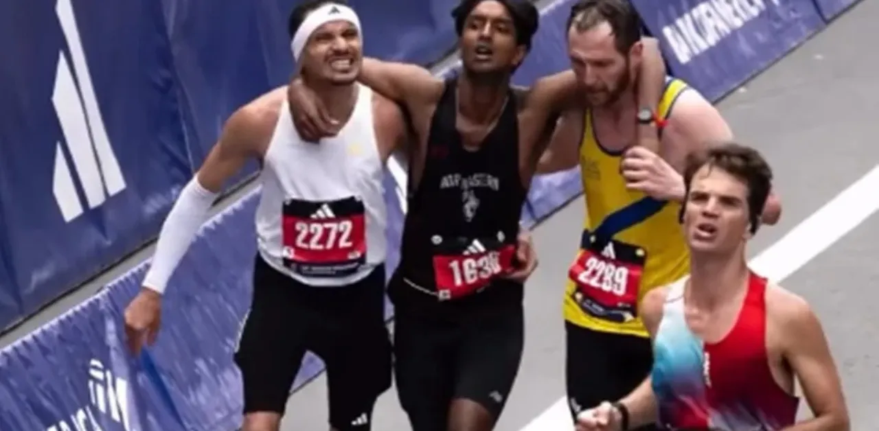 Durante o percurso final, Oliveira percebeu que o corredor Ajay Haridasse apresentava sinais de exaustão e não conseguia seguir sozinho.