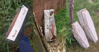 Chuva derruba muro de funerária e caixões param em rio