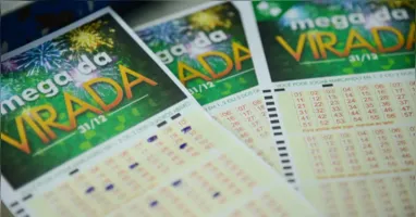 Volume recorde de apostas e estatística explicam por que a Mega da Virada sempre termina com o prêmio dividido.