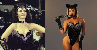 Com body preto ultracavado e cravejado de cristais, Virginia desfilou com elegância e exibições felinas, complementando o look com a famosa coleira.