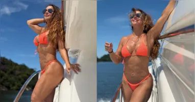 Viviane Araújo aproveita passeio de barco e exibe boa forma aos 50 anos, recebendo elogios de fãs e colegas de elenco nas redes sociais.
