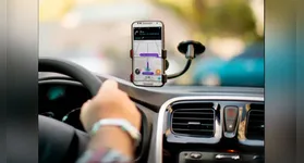 Interior de veículo com QR Code para pagamento; modalidade foi utilizada para a transferência do valor irregular.