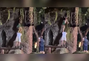 Circula nas redes um vídeo que mostra um casal tentando subir em um castelo fechado na Praça Batista Campos, em Belém.