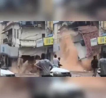 Imagem ilustrativa da imagem Vídeo: prédio desaba em Ubá durante forte temporal