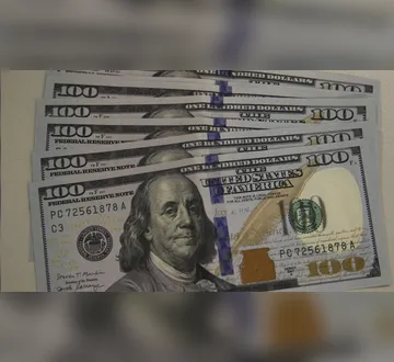 Imagem ilustrativa da imagem Após dias seguidos de alta, dólar cai e fecha em R$ 5,53