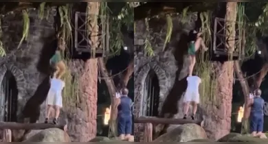 Circula nas redes um vídeo que mostra um casal tentando subir em um castelo fechado na Praça Batista Campos, em Belém.