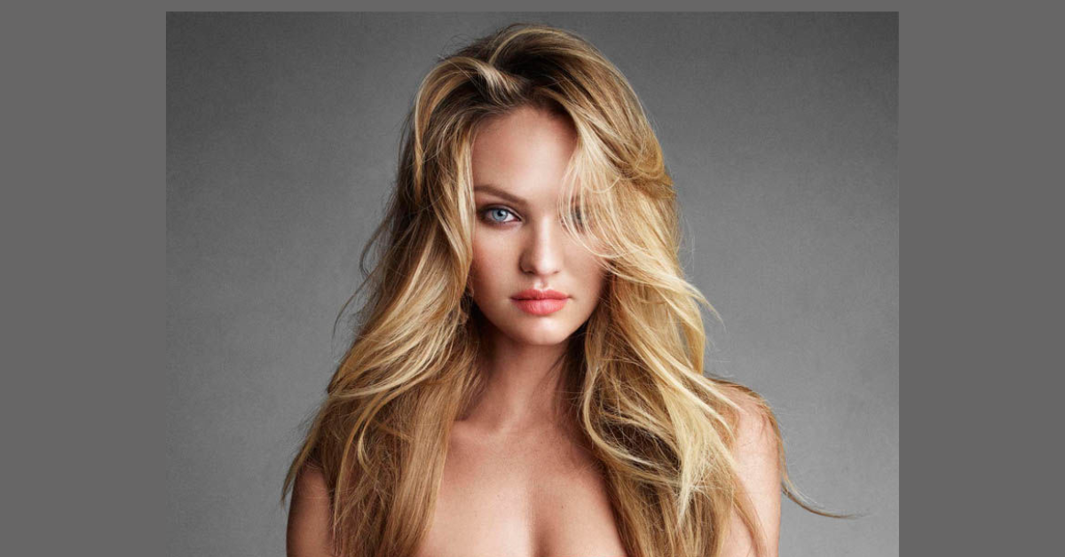 Candice Swanepoel posa em ensaio fotográfico em Paris e chama atenção ao combinar biquíni estampado com bota de salto alto.
