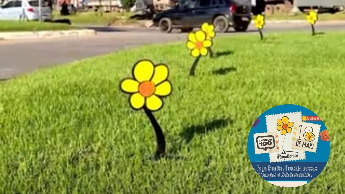 Ornamentação com símbolos do Maio Laranja na Avenida Xingu