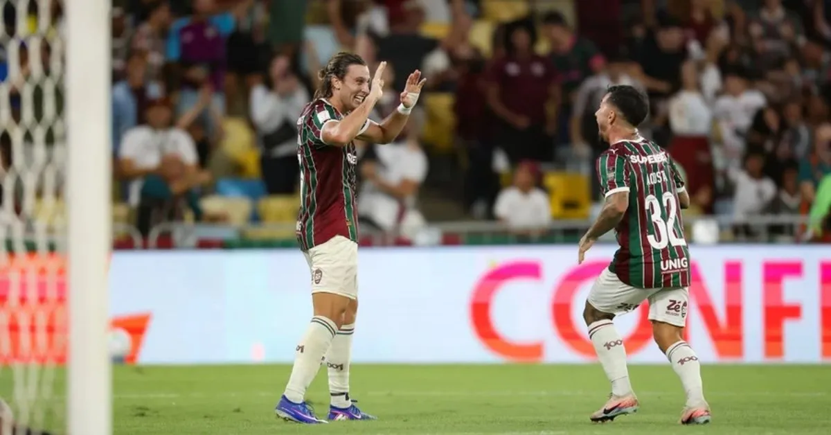 Jogadores do tricolor carioca comemora a vitória sobre o tricolor paulista