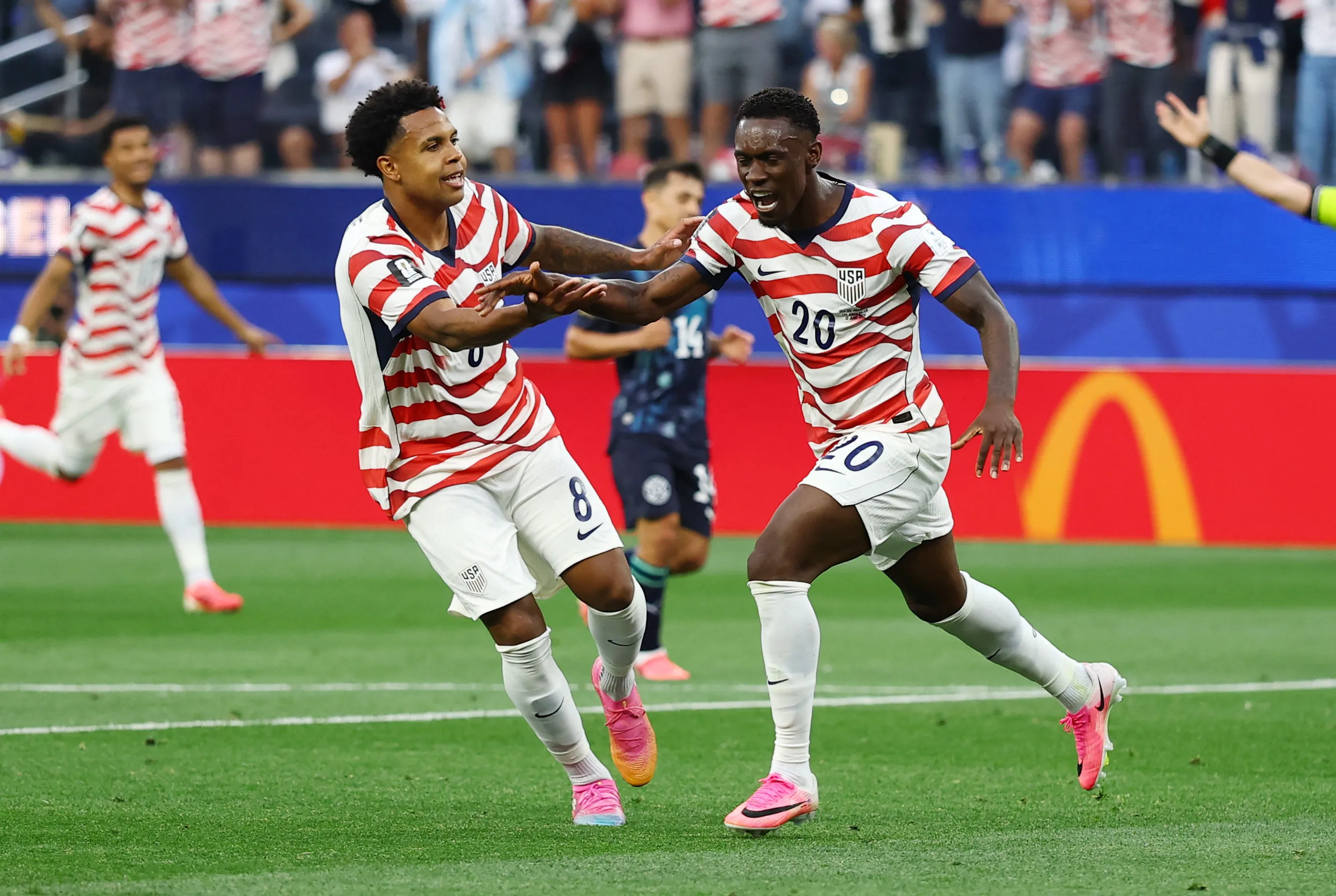 Soccer Football - FIFA World Cup 2026 - Group D - United States v Paraguay - Los Angeles Stadium, Inglewood, California, U.S. - June 12, 2026 Folarin Balogun of the U.S. celebrates scoring their second goal with Weston McKennie REUTERS/Matthew Childs