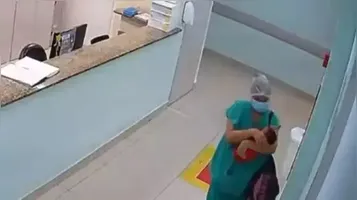 A mulher trabalhava na maternidade, mas estava de folga no dia da ação.