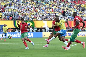 Soccer Football - FIFA World Cup 2026 - Group C - Brazil v Morocco - New York/New Jersey Stadium, East Rutherford, New Jersey, U.S. - June 13, 2026 Brazil's Igor Thiago shoots at goal under pressure from Morocco's Chadi Riad, Neil El Aynaoui and Issa Diop REUTERS/Dylan Martinez