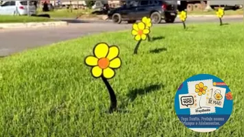 Ornamentação com símbolos do Maio Laranja na Avenida Xingu
