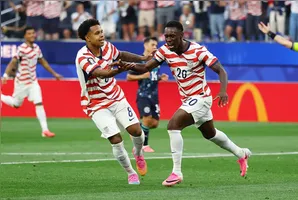 Soccer Football - FIFA World Cup 2026 - Group D - United States v Paraguay - Los Angeles Stadium, Inglewood, California, U.S. - June 12, 2026 Folarin Balogun of the U.S. celebrates scoring their second goal with Weston McKennie REUTERS/Matthew Childs