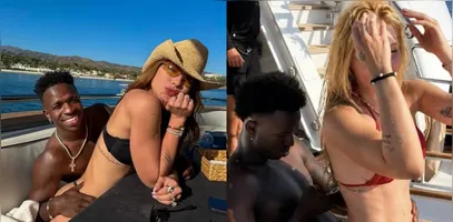 Na imagem, Virginia aparece sentada no colo de Vini Jr., enquanto ele mexe no celular.