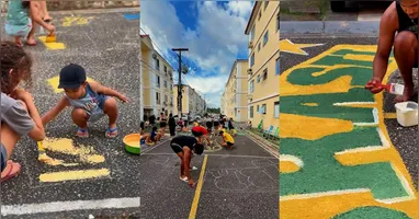 Mesmo com a redução das tradicionais ruas decoradas nas últimas Copas, a influenciadora Pamela Cruz viralizou ao mobilizar moradores para pintar uma via inteira em clima de Mundial.