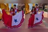 Victor e Maria encantaram internautas ao dançar carimbó na Estação das Docas, em Belém, usando figurinos inspirados na bandeira do Pará.
