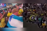 Bandeira dos times paraenses aparecem em maio a multidão em clima de festa.