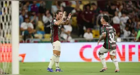 Jogadores do tricolor carioca comemora a vitória sobre o tricolor paulista