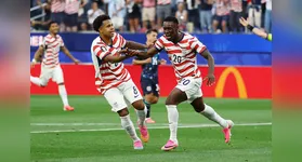 Soccer Football - FIFA World Cup 2026 - Group D - United States v Paraguay - Los Angeles Stadium, Inglewood, California, U.S. - June 12, 2026 Folarin Balogun of the U.S. celebrates scoring their second goal with Weston McKennie REUTERS/Matthew Childs