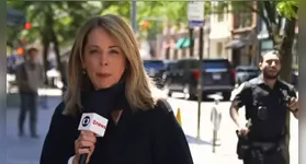 A repórter Sandra Coutinho fazia a trasmissão ao vivo quando ocorreu a perseguição policial.