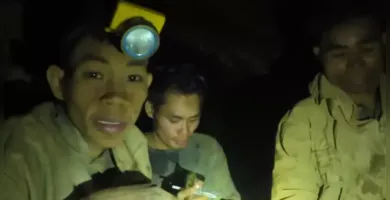Imagem ilustrativa da imagem Presos em caverna inundada no Laos enviam mensagens às famílias