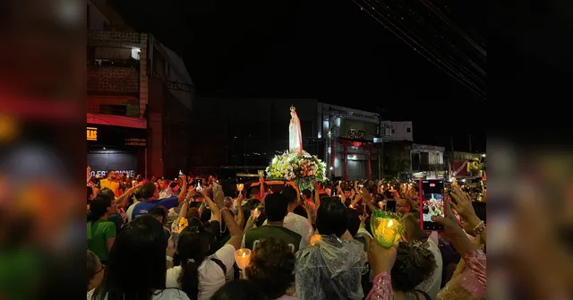 Imagem ilustrativa da notícia Mesmo sob forte chuva, fiéis participam de Procissão Luminosa em Belém