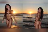 Aline Campos posa de biquíni diante do pôr do sol durante viagem pela Bahia e encanta seguidores.