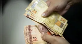 Saiba sobre o previsto reajuste do salário mínimo para R$ 1.717 em 2027 e seu impacto na economia brasileira.