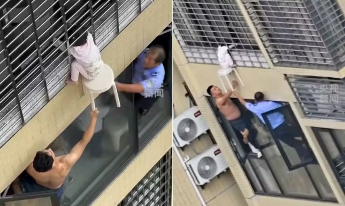 Menina é salva por vizinhos após ficar pendurada no 12º andar de um prédio na China. A rápida mobilização evitou uma tragédia.