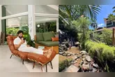 A integração com a natureza foi um dos principais elementos considerados no projeto da casa, que conta com grandes janelas de vidro para ampliar a entrada de luz natural e proporcionar uma vista para a vegetação ao redor