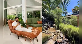A integração com a natureza foi um dos principais elementos considerados no projeto da casa, que conta com grandes janelas de vidro para ampliar a entrada de luz natural e proporcionar uma vista para a vegetação ao redor
