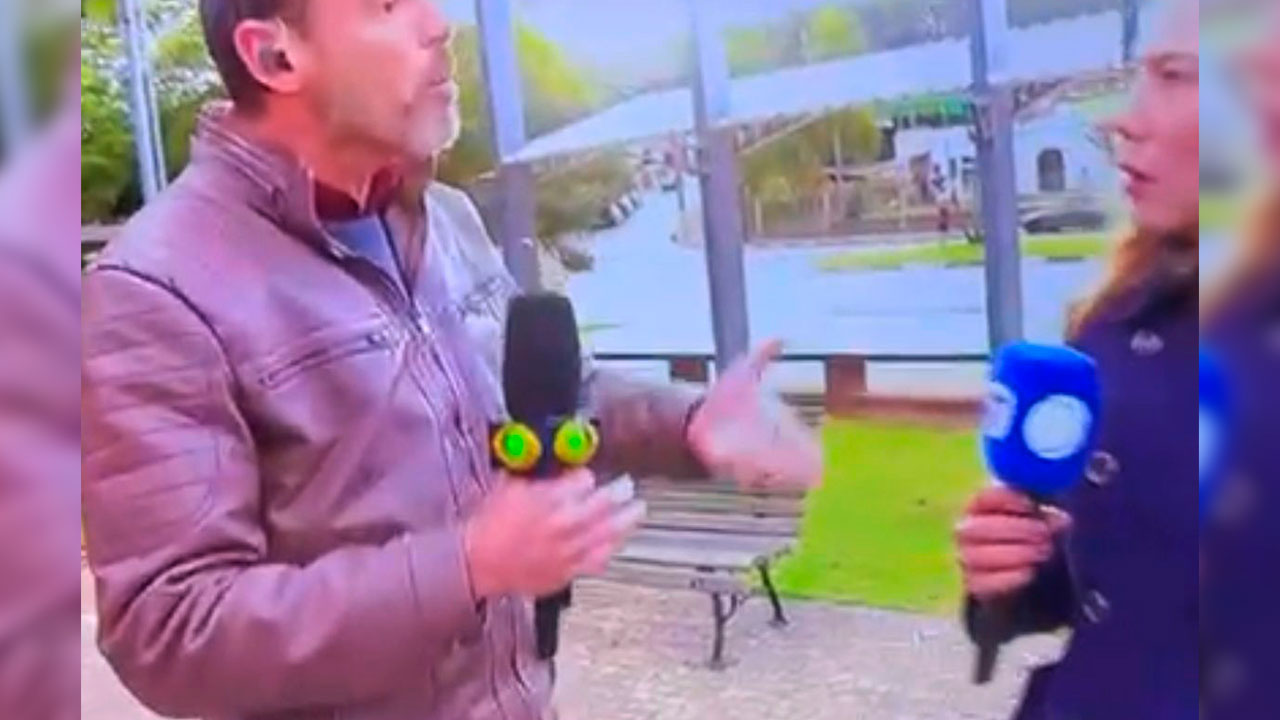 Nas imagens não é possível ver, mas a repórter da Record declarou que o jornalista do Band a empurrou