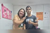 Gerson de Melo Machado, conhecido como “Vaqueirinho”, com a conselheira tutelar Verônica Oliveira.