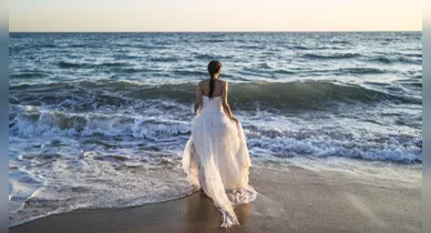 Imagem ilustrativa da notícia: Noiva morre afogada durante sessão de fotos por causa de vestido