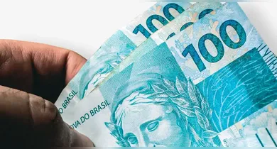 Imagem ilustrativa da notícia: Caixa paga R$ 300 em abril: veja quem recebe e regras