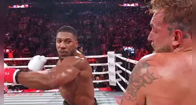 Imagem ilustrativa da notícia: Joshua vence em luta com direito a mandíbula fraturada de Jake Paul