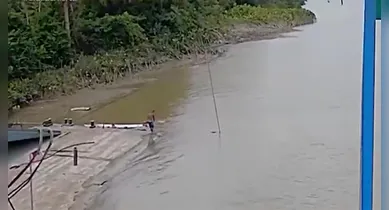 Imagem ilustrativa da notícia: Vídeo: casal é flagrado abandonando corpo no rio Maguari, em Belém