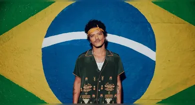 Imagem ilustrativa da notícia: Pegou mal! Bruno Mars é "cancelado" após divulgar show de Chris Brown