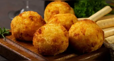 Imagem ilustrativa da notícia: Bolinho de arroz crocante na Air Fryer: conquiste todos com sabor!