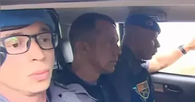 Tenente-coronel Geraldo Neto deixa condomínio sob escolta da Polícia Militar após prisão no interio de São Paulo.