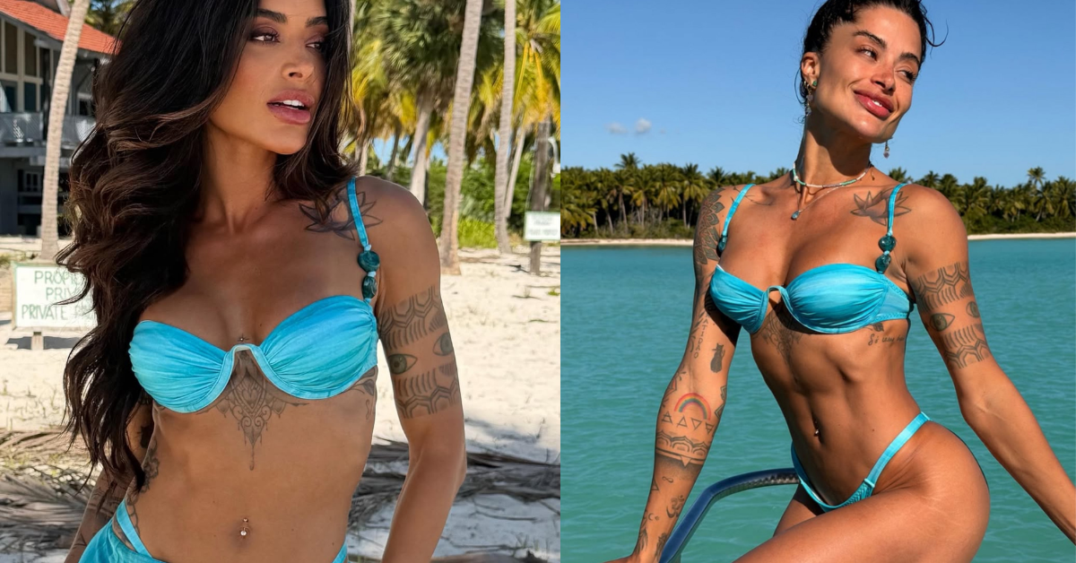 Aline Campos posa de biquíni azul durante dia de descanso em praia do Caribe.
