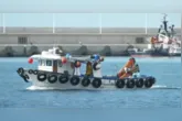 Passageiros do cruzeiro MV Hondius começaram a desembarcar no porto de Granadilla, em Tenerife, sob esquema especial de monitoramento sanitário.